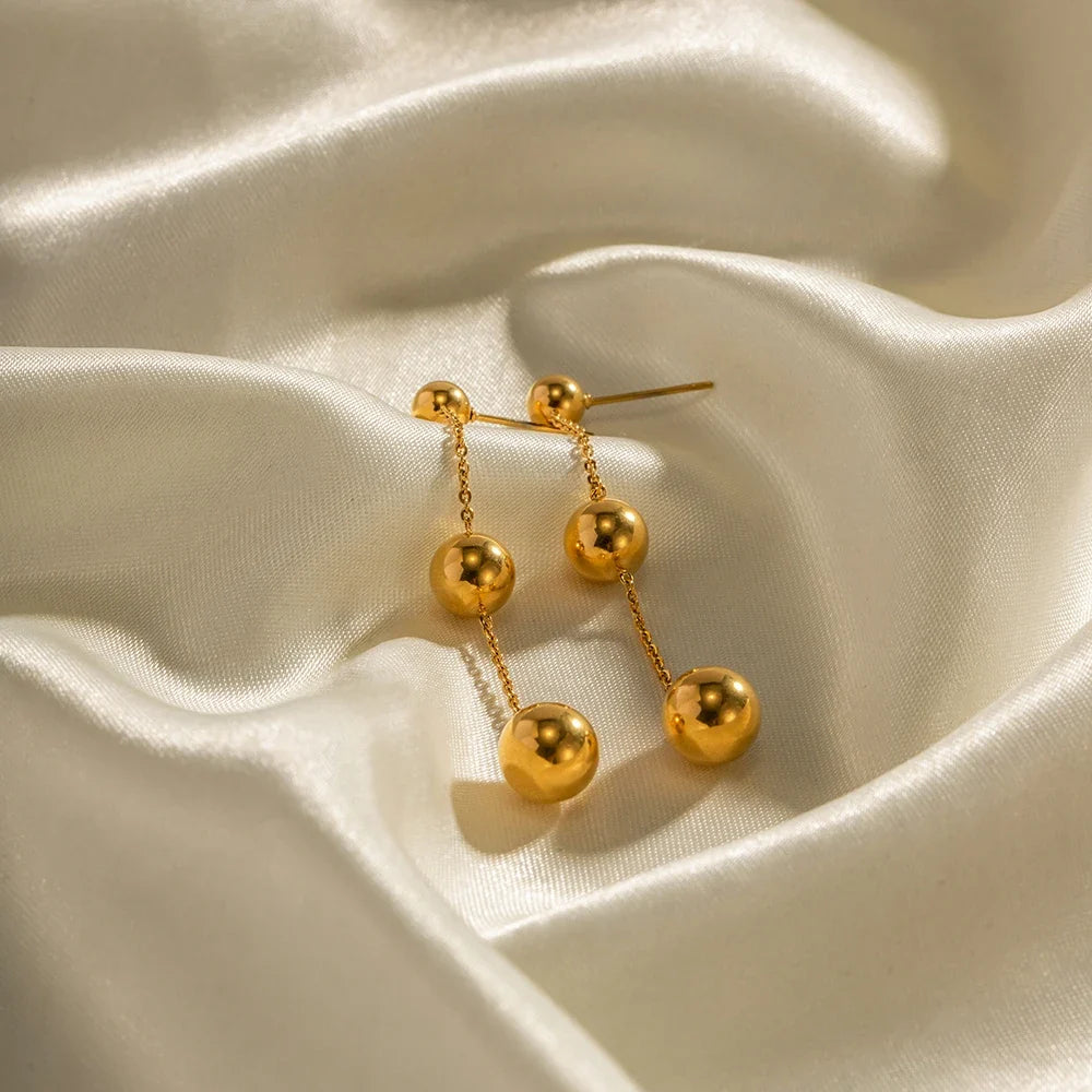 Dangle Gold Bead Tassel Earrings