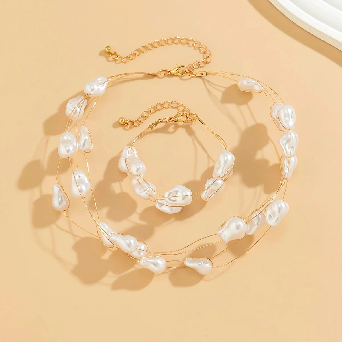 Layered Strung Pearls Bracelet and Necklace