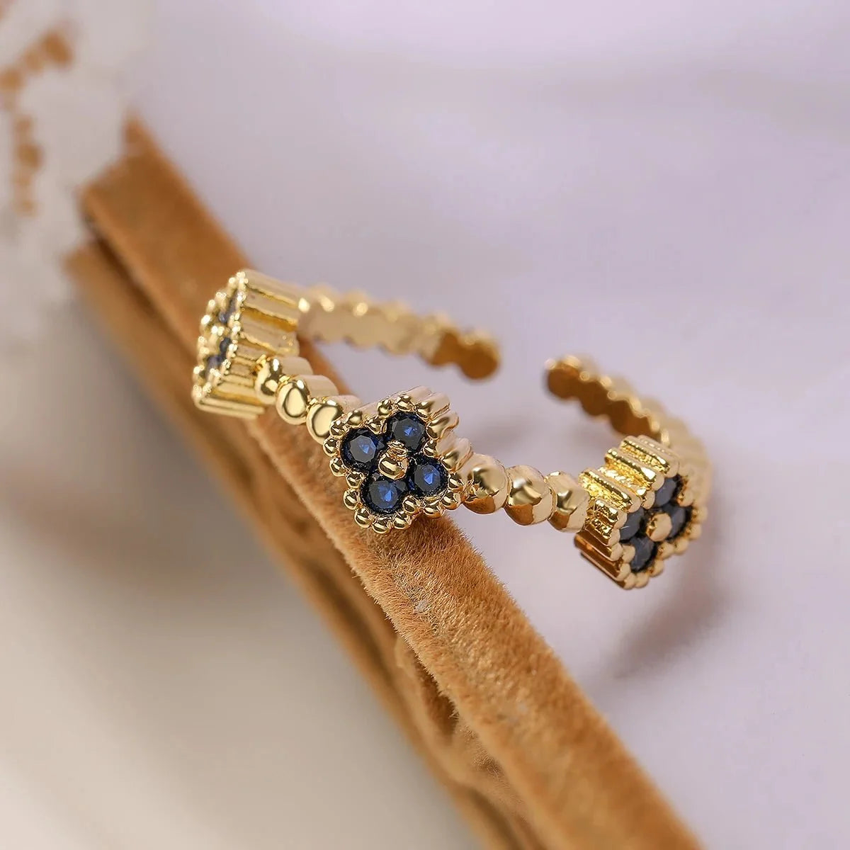 Resizable Trio Textured Floral Rings